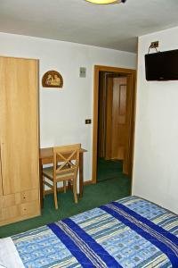 Voodi või voodid majutusasutuse Albergo Ristorante Iris toas