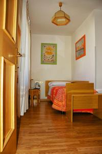 Voodi või voodid majutusasutuse Albergo Ristorante Iris toas