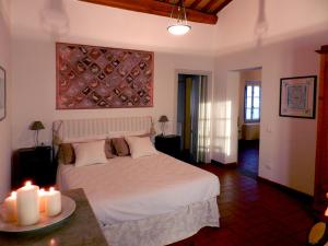 Postel nebo postele na pokoji v ubytování Agriturismo Gli Archi