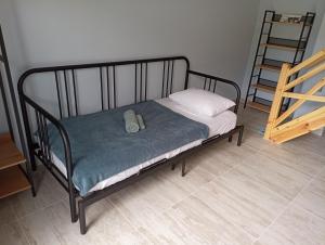 Postel nebo postele na pokoji v ubytování Xristos apartment and maisonettes