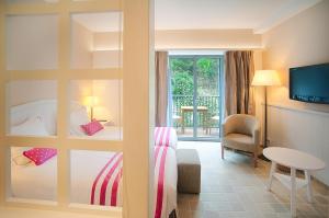 Postel nebo postele na pokoji v ubytování Hotel Playa Sol