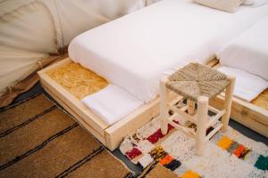A bed or beds in a room at Tres Estrellas Costa Brava