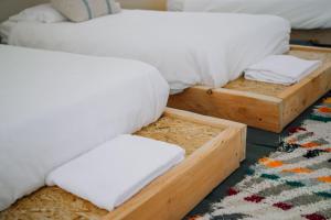 A bed or beds in a room at Tres Estrellas Costa Brava