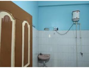 Kylpyhuone majoituspaikassa Sagar Lodge, Bishnupur, WB