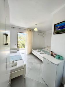 Voodi või voodid majutusasutuse Ionian View B&B toas