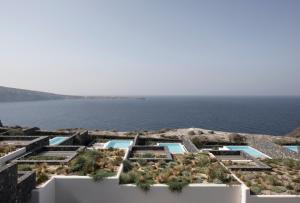 a view of the ocean from a building at Canaves Epitome - Small Luxury Hotels of the World in Oia