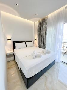 Voodi või voodid majutusasutuse Ionian View B&B toas