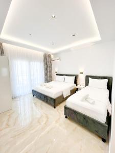 Voodi või voodid majutusasutuse Ionian View B&B toas
