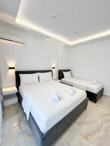 Voodi või voodid majutusasutuse Ionian View B&B toas
