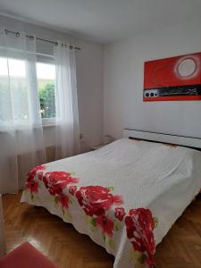 Postel nebo postele na pokoji v ubytování Vilma A2 plus 1
