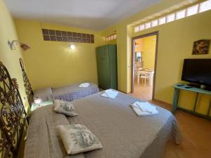 Un pat sau paturi într-o cameră la Borgo Gaggi