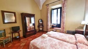 Postel nebo postele na pokoji v ubytování Casa Tinoco Casa Rural Categoria Superior