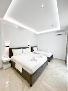 Voodi või voodid majutusasutuse Ionian View B&B toas