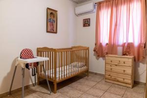 Postel nebo postele na pokoji v ubytování Villa Sofita