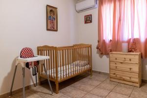 Postel nebo postele na pokoji v ubytování Villa Sofita