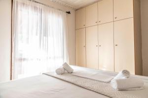 Postel nebo postele na pokoji v ubytování Villa Sofita