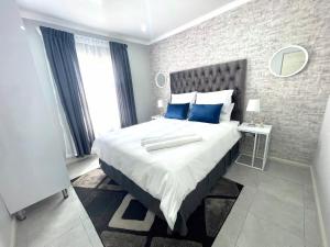 Postel nebo postele na pokoji v ubytování Reros Apartments in Mankweng