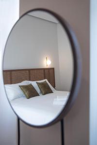 Letto o letti in una camera di Mythodea Athens Suites
