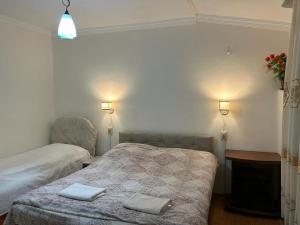 Postel nebo postele na pokoji v ubytování Homestay Seaside by Manuchar