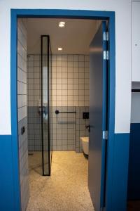 Koupelna v ubytování De 6 Linden Boutique Hotel