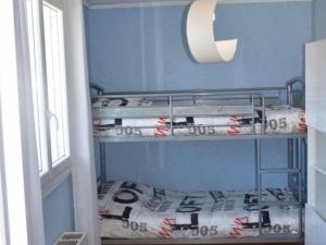 Posteľ alebo postele v izbe v ubytovaní **Appartement T3 Centre-Ville La Roche-Posay avec Piscine, Terrasse et Wi-Fi** - FR-1-541-74