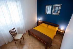 Postel nebo postele na pokoji v ubytování Clementa Apartment