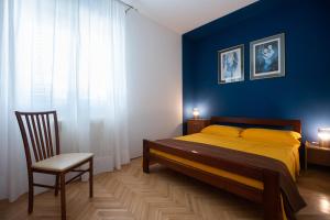 Postel nebo postele na pokoji v ubytování Clementa Apartment