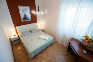 Postel nebo postele na pokoji v ubytování Clementa Apartment