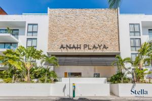 a building with a sign that reads ana playa at A-Nah Apartments, Rooftop Pool, walking distance to 5th avenue in Playa del Carmen