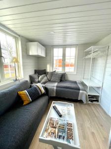 Posezení v ubytování Lyckan - Minihus i lantlig miljö