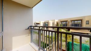a balcony view of a building at Key View - Maple 2 in Dubai