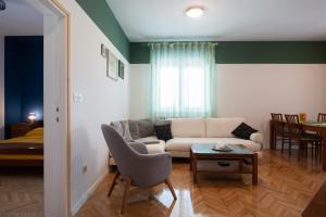 Posezení v ubytování Clementa Apartment