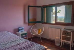 Postel nebo postele na pokoji v ubytování Cal Cabrer + 11 fotografií