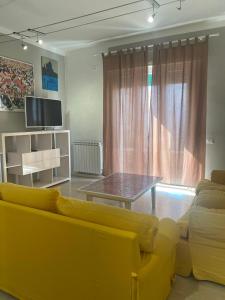 Posezení v ubytování MD HOUSE + 16 fotografií