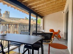 Balkon lub taras w obiekcie Gîte au pied de la Cité Médiévale - Le 127