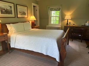 Ένα ή περισσότερα κρεβάτια σε δωμάτιο στο Goodstone Inn & Restaurant