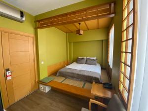Postel nebo postele na pokoji v ubytování Bunkahaus