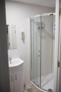Ένα μπάνιο στο Ballycastle 7A Diamond 2 bedroom apartment +12 φωτογραφίες