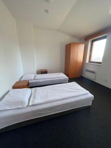 Kvildahotel客房内的一张或多张床位