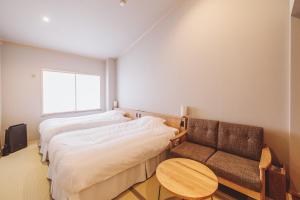 Postelja oz. postelje v sobi nastanitve 蓼科BASE kitchen,spa&hotel