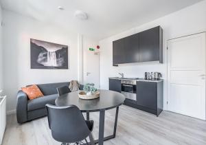 Kuchyň nebo kuchyňský kout v ubytování Ingolfsstræti Apartments by Heimaleiga + 39 fotografií