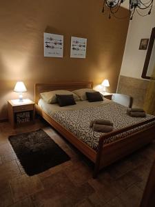 Ένα ή περισσότερα κρεβάτια σε δωμάτιο στο casa Maria