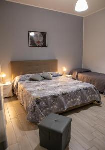 Ein Bett oder Betten in einem Zimmer der Unterkunft zuroli suite
