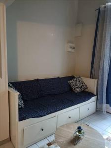 Χώρος καθιστικού στο Agréable et paisible studio +3 φωτογραφίες