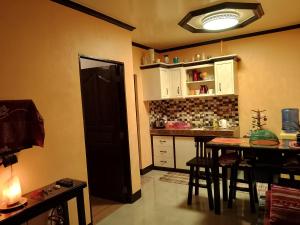 Kuchyň nebo kuchyňský kout v ubytování Leigh HomeStay
