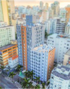 a model of a city with tall buildings and palm trees at Higienópolis The Standard Residence in Sao Paulo