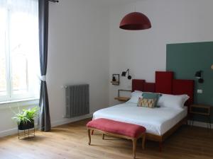 Postel nebo postele na pokoji v ubytování Ottantotto Viterbo