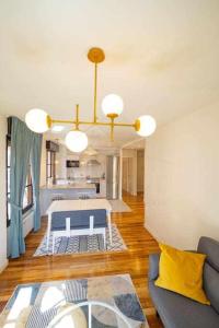 Ένα ή περισσότερα κρεβάτια σε δωμάτιο στο Tabacalera by Silastur