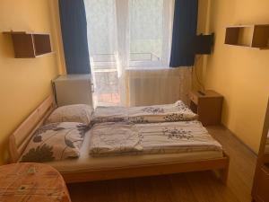 Postel nebo postele na pokoji v ubytování GWIAZDA MORZA