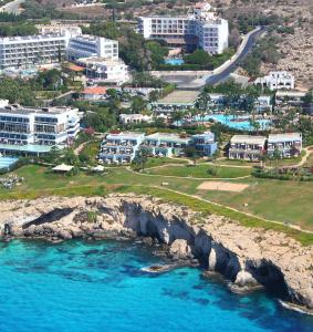 an aerial view of a city and the ocean at Marina Hotel in Ayia Napa